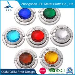 Wholesale Metal Crafts Fashion Promotional Royal Crown Bag Hanger Meta Folding Purse Hook - Image 1