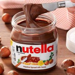 Nutella Chocolate Artificial Additives None Flavor Rich, Nutty, Chocolatey Texture Smooth, Creamy, Spreadable Ingredients Roasted Hazelnuts, Skim Milk, - Image 2