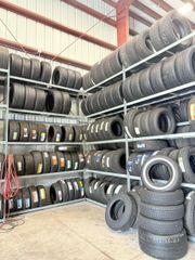 Wholesale Warehouse Used & New Auto Tires Lot – Racked Assorted Sizes - Image 2