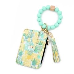 Stylish Leather Tassel Flower Keychain and Silicone Bead Bracelet - Image 2