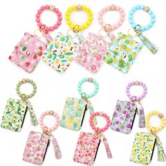 Stylish Leather Tassel Flower Keychain and Silicone Bead Bracelet - Image 1