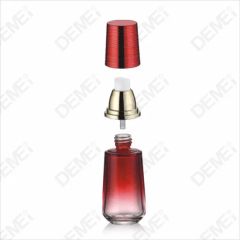 Elegant Red Glass Cosmetic Container with Gold Lotion Pump - Image 1