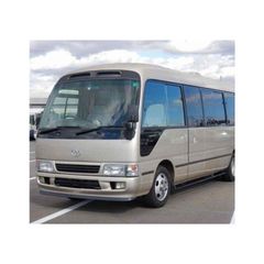 Toyota Coaster minibus for long distance travel and group transportation Toyota Coaster bus with strong body design and advanced safety features Toyota Coaster vehicle for public transport and private hire services Toyota Coaster high roof bus for maximum passenger capacity - Image 3