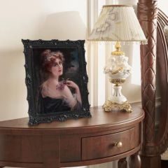 12 Inch Vintage Resin Frame Distressed Wood Look Oval Photo Frame with Carved Florals - Image 1