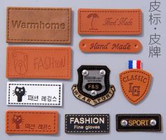 Customized PVC Leather Label with Metal Logos Size 4cm*9cm Origin China Gender Unisex Model NO. 9203 Style Velcro-on Age Group - Image 1