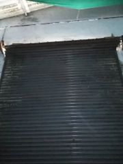 Manual Rolling Shutter, Height: 7 Feet Gear Yes Motor Yes Height 7 Feet Material Aluminium Location Tamil Nadu Firing Temperature 1100 - Image 2