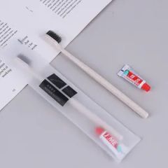 Hotel Slipper and Toothbrush with Mini Toothpaste Travel Essentials - Image 1