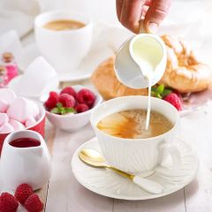 Exquisite Large Spoon New Design White Porcelain Tea Cups and Saucers - Image 6