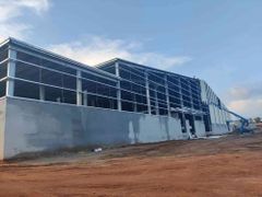 Warehouse Construction Service Load Capacity Heavy Structural Durability High Space Utilization Maximized Construction Precision - A P Power & Concrete