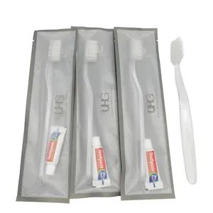 Hotel Amenities Disposable Toothbrush Travel Toothbrush with Toothpaste Inside - Yangzhou Top Daily Chemical Co., Ltd. - China