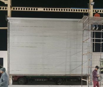 Galvanized Steel Automatic Rolling Shutter with Side Motor (230 V AC) - Mahadev Shutter Automation - India