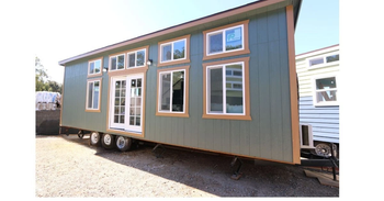 9 x 32 MODERN CARAVAN DUAL LOFT Tiny house for sale on wheels READY TO SHIP from senesie mfg llc 9 x 32 MODERN CARAVAN DUAL LOFT Tiny house for sale on wheels READY TO SHIP - senesie mfg llc - United States