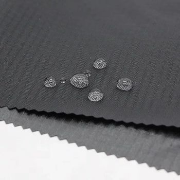 Nylon Ripstop Fabric 210d 0.4 Grid with PU Waterproof Fabrics Woven High Quality Hot Waterproof Material Tl Curtain Weight 0.2mmfabric for Workwear - China Xinxing Shanghai Import and Export Co., Ltd. - China