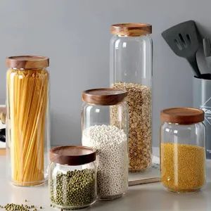 Elegant Acacia Striped Stackable Glass Storage Jar for Organizing Stylish Acacia Wood Striped Glass Jar - Feiya Group Co., Limited - China