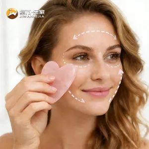 Jiwan Lejia Factory Price OEM Customized Rose Quartz Natural Jade Pink Crystal Love Shape Stone Heart Massage Stone Gua Sha for Body SPA - Anshan Jiwan Jade Mattress Co., Ltd - China