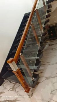 Wooden Glass Railing, For Staircase, 12 mm Material Wooden Finish SS Glossy Glass Type Toughened Glass Thickness 12 mm Application - Dhanlakshmi Steel - India