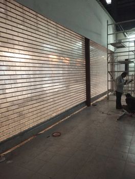 Motorised Rolling Shutter Operation All Material Iron Shutter Thickness 1.2 mm Max Shutter Width 35 ft. Max Shutter Height 25 - Bharat Rolling Shutter - India