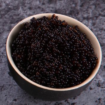 Japanese cuisine flying fish roe frozen black caviar Style FROZEN Ingredients Non Weight (kg) 0.5 Variety Fishing Roe Shelf Life 24 - Xiamen East Ocean Foods Co., Ltd. - China