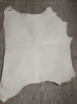 Semi Finished White SHEEP E.I TANNED LEATHER Color White Pattern Plain Texture Tanned Thickness 0.7 mm Usage Making  - S.S. International (Exports) Tanning - India