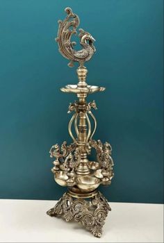 Golden Brass Peacock Diya Stand, For Home Design Peacock Material Brass Finish Polished Weight 4 Kg, 4 kg Finishing - Megh Art - India