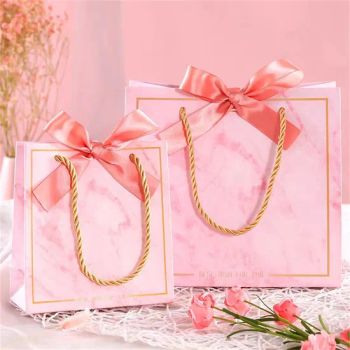 Custom Luxury Clothing Retail Bag Packing Pink Gift Bag Bolsas De Papel Shopping Packaging Paper Bags with Handles for Clothes - Shenzhen Yonglixing Printing Ltd. - China