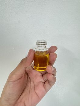 PATCHOULI OIL DARK/LIGHT Origin Indonesia Product Type Oils Color Yellow To Brown Appearance Clear Liquid Patchouli Alcohol Min. 30%% - MIGNON SISTA INTERNATIONAL - Global