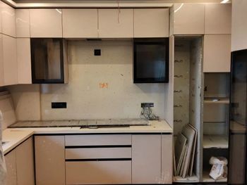 L Shaped Modular Kitchen Cabinet Material HDHMR Shutter Finish Glossy - TWD Construction - India