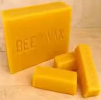 Pure Golden Yellow Beeswax Pellets 12.5kg MOQ 1 Ton Brand OEM Melt 62-67 Origin China Trademark XL Packaging Bags Model NO. - Xinle City Hongyuan Carbon Black Sales Center - China