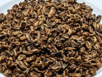 Black Tea Golden Black Snail Color Nature Origin China Age 1-2years Type Black Tea Grade Top Grade Certification Nop Model NO. Black - Changsha Nutrahealth Bio-Tech Co., Ltd. - China