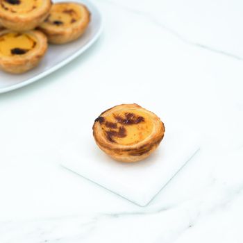 Pastel de Nata Origin Lisbon, Portugal Flavor Sweet With Richness And Traditional Portuguese Taste Texture Crispy, Flaky Crust With Creamy, Custard-filled - Panike - Portugal