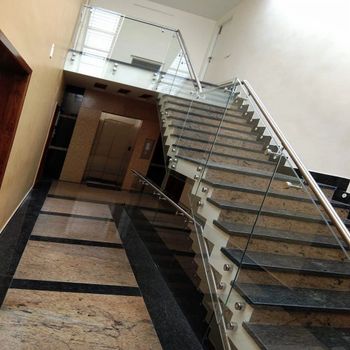 Stairs Stainless Steel Glass Railing, For Home Position Stairs Construction Sturdy Usage/Application Home Design Bar, - Designer Homes - India