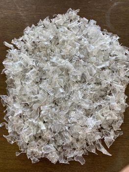 Industrial Grade PET Flakes Hot Washed & Low Moisture Clear/Light Blue for Molding Plastic Sheet Thermoforming Applicati from TRADECENTRIC LLC Industrial Grade PET Flakes Hot Washed & Low Moisture Clear/Light Blue for Molding Plastic Sheet Thermoforming Applicati - TRADECENTRIC LLC - United States