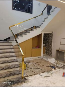 Pvd gold Glass Stair Railing, For Staircase, 12mm Steel Grade SS202 Glass Thickness 12mm Material Grade SS 202 Application - Vinayaka Steel Railing - India