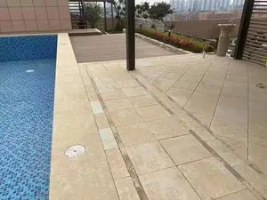 Cream Colored Limestone for Paving Walling Swimming Pool with Slight Variation Tan Beige But Very Light Sand Blasted Face Chiseled Split Fine Adze - Xiamen Leading Stone Import & Export Co., Ltd. - China