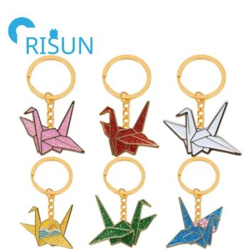 Manufacture Wholesale Custom Metallic Sport Origami Enamel Jewelry Keyring Key Chain Glitter Sakura Paper Crane Metal Keychain with Pendant - Shenzhen Risun Trading Co., Ltd. - China