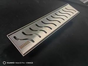Stylish Linear Drain for Showers with Odor Prevention Insert Origin China Model NO. CYV HS Code 73249000 Trademark - Ningbo Hitech DAW Sanitary Ware Co., Ltd. - China