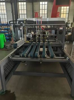 Smooth Operation Low Energy Consumption Gluing Machine for Food Packaging - Dongguang County Jiuyu Machinery Manufacturing Co., Ltd. - China