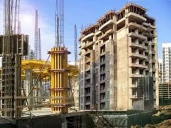 Commercial Construction Service in Ahmadabad Building Foundations Laying The Groundwork For The Structure Project Coordination Managing Timelines, Contractors, And - Anurag Infracon - India