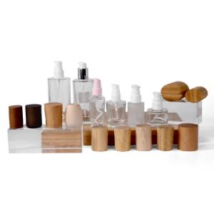 Wholesale 30g 50g 40ml 100ml 120ml Cosmetic Glass Lotion Bottle Bamboo Wood Cap for Skincare Face Cream Lotion Bottle - Zhongshan Yicai Bamboo Products Co., Ltd. - China