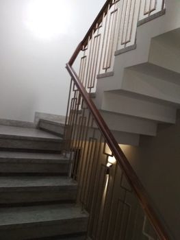 MS Staircase With Wooden Handrail Position Stair Handrail Color Brown Usage/Application Home Handrail Finish Polished Handrail Material - Prabhdarshan Engg. Works - India