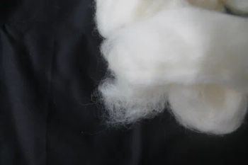 Wool Top 100% Wool Puffy White W-1 JIANGNAN 26.8 MOQ100 15D Color White Origin China Feature Puffy Model NO. W-1 Structure Tops - Jiangnan Textiles (Shanghai)Ltd - China