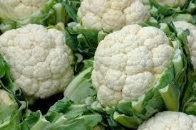 Fresh Cauliflower Size 12cm to 20cm diameter Color White with green protective leaves Packaging 8kg cartons or custom options - VGE Vegetables Global Export - Vietnam