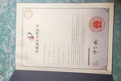 Certificate of design patent certificate from Yunnan Menghuang Trade Co., Ltd.