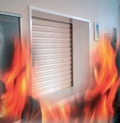 Fire Rated Rolling Shutters Fire Rating Fusible Links Mounted On Both Sides Of The Wall Automatic Closure Mechanism Separates To Automatically Close The - Image 1