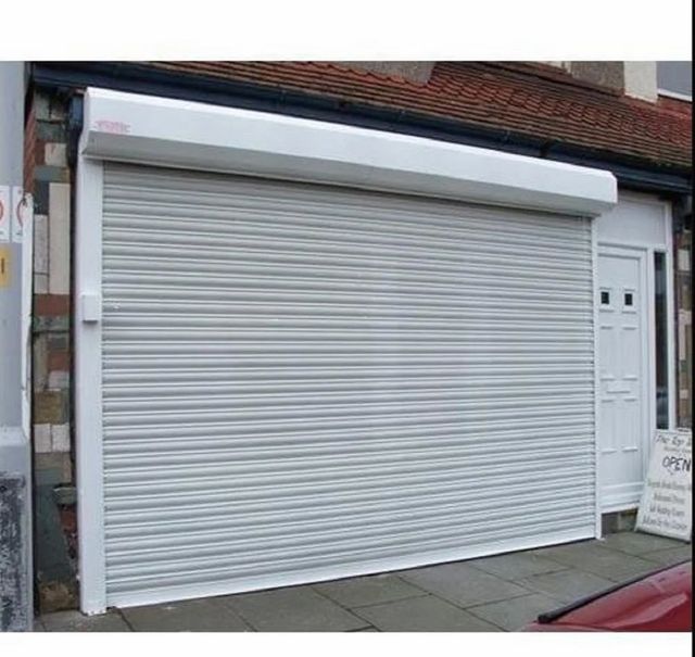 Full Height Automatic Aluminium Rolling Shutter Voltage 220V Height 8 feet Frequency 50Hz Style Full Height Brand Sandeep - Image 1
