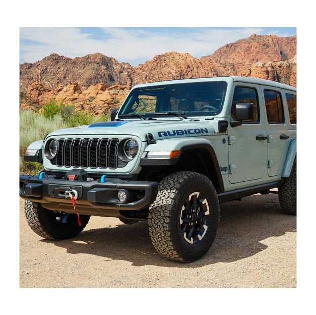Jeep Wrangler adventure SUV with rugged design strong chassis high ground clearance powerful engine removable top and doors ideal for off road driving trail riding and exploring extreme environments with comfort - Image 4