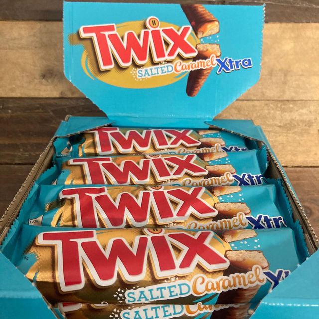 Rich Twix Chocolate Bar Experience Crunchy Biscuit And Caramel Fusion Covered In Creamy Chocolate For Sweet Satisfaction - Image 1