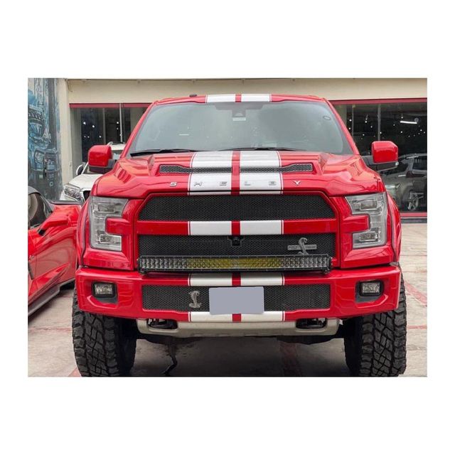 Ford F-150 modern full size truck with turbocharged engine options high performance capability advanced technology features strong towing and hauling capacity perfect for business construction and off road driving - Image 1