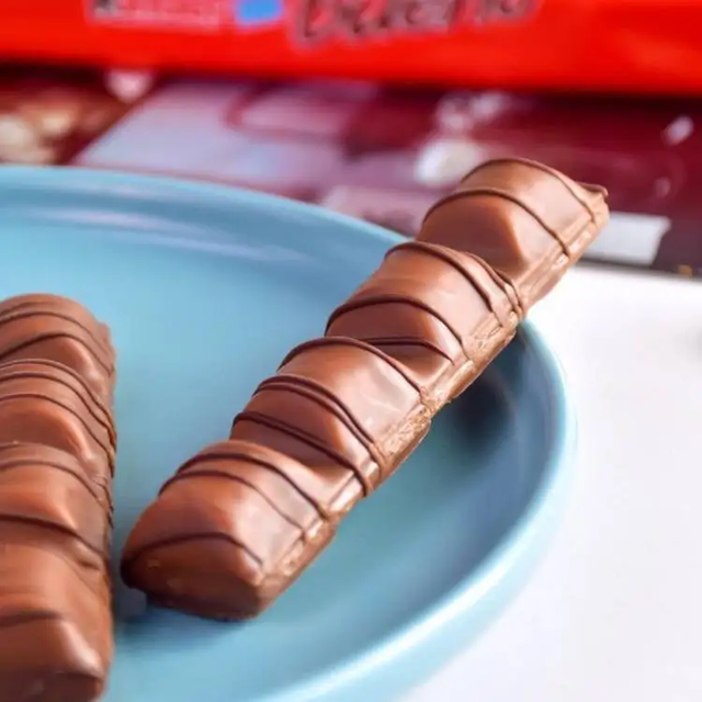 Delight your customers with our Premium Milk Hazelnut Wafer Chocolate, featuring crispy layered wafers filled with rich hazelnut cream and coated in smooth milk chocolate. Perfect for retail stores, supermarkets, office pantries, vending machines, party events, and gift packages. Available in convenient 30-pack wholesale cartons with competitive pricing, reliable supply, and worldwide export options. A delicious, high-demand snack that combines crunch, sweetness, and premium quality in every bite. - Image 3