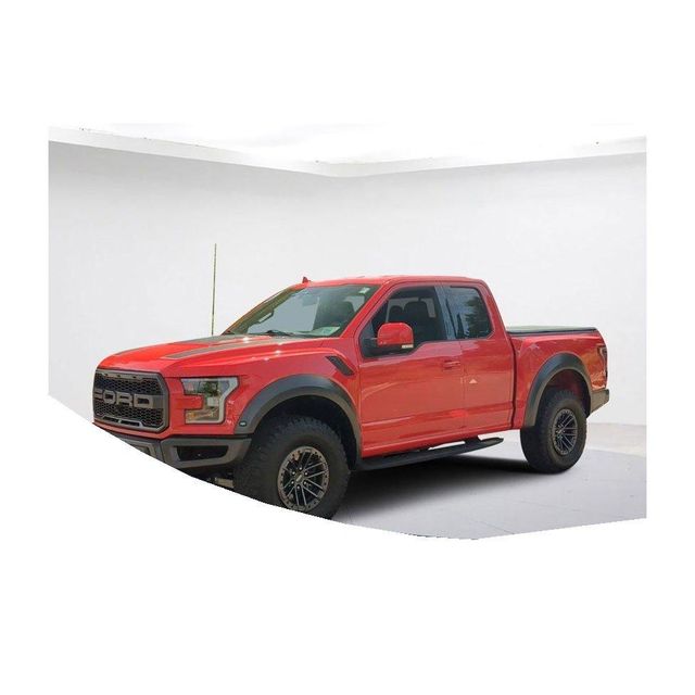 Ford F-150 pickup truck best in class towing capacity rugged exterior design advanced suspension system spacious interior smart features and powerful engine ideal for work travel and extreme terrain driving - Image 4